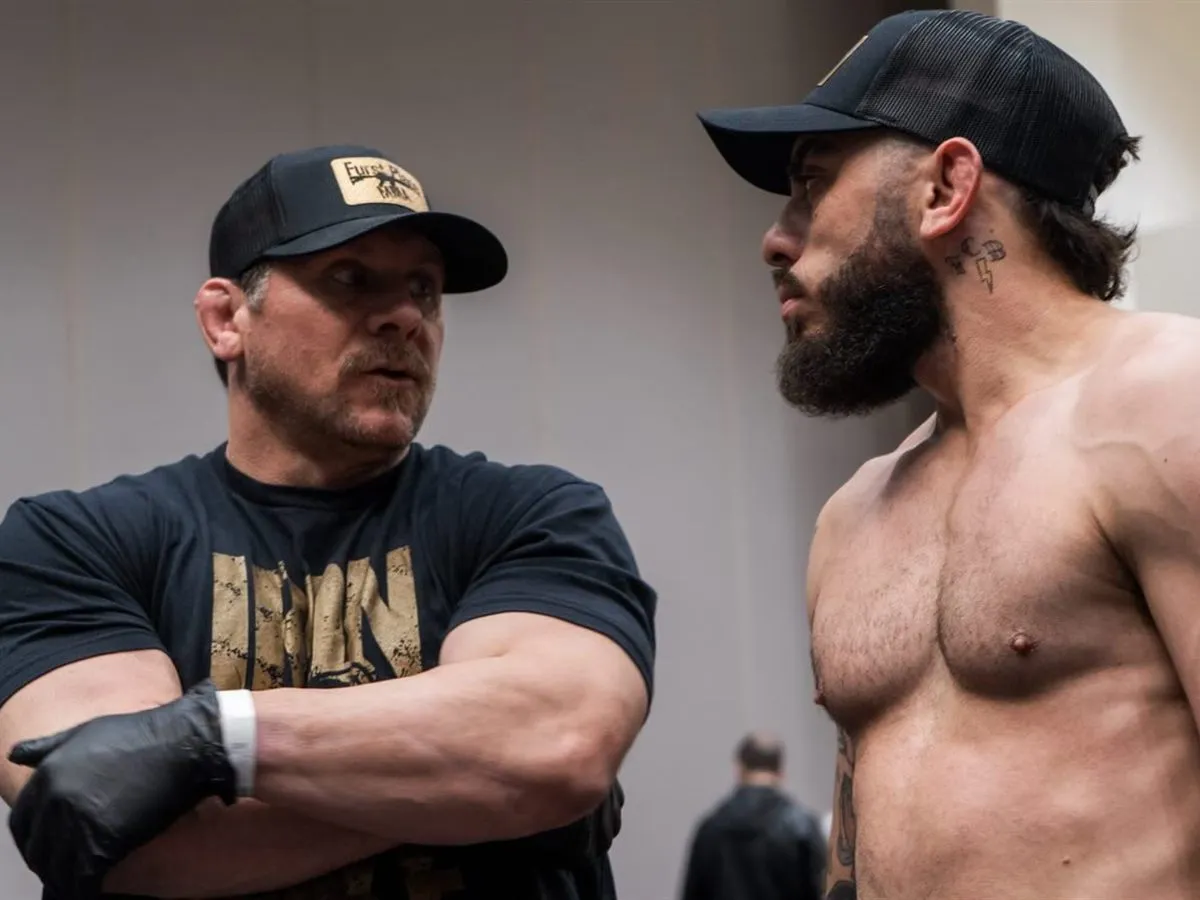 Iron Mike talking a fighter through the game plan before a bout